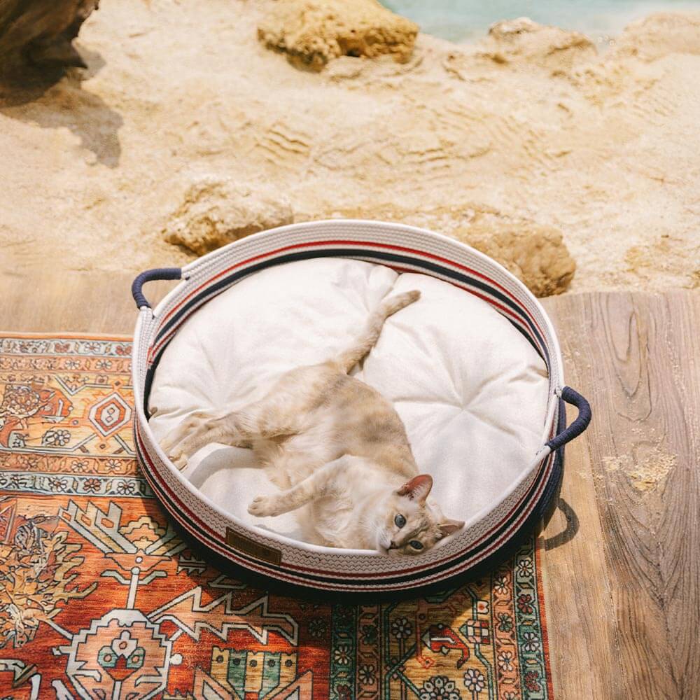 Handcrafted Stripe Calming Pet Bed - Timeless Nest